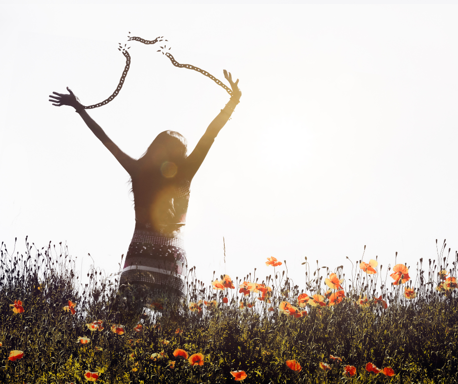 woman breaking free of chains